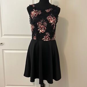 Francesca’s black floral dress. Size M. New with tags